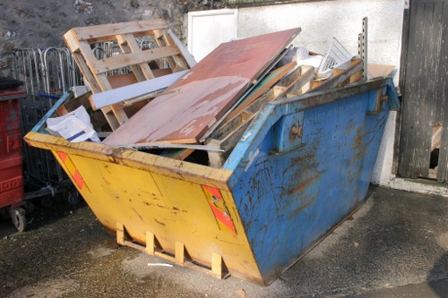 House clearance professionals in Aldgate removing furniture