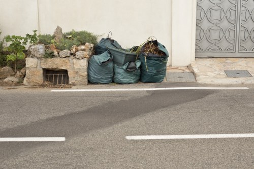 Construction site with builders waste removal equipment