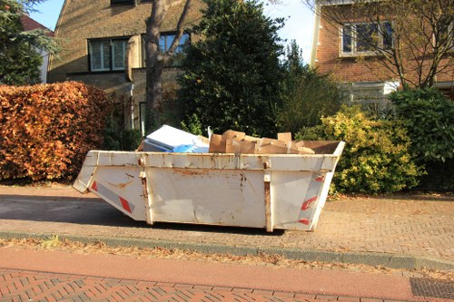 Various sizes of enclosed skips available for hire in Aldgate